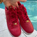 Nike - Women’s Air Force 1 Low Red Gold Swoosh Sneaker, Size 8 Photo 1