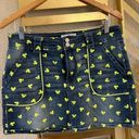 Disney  NEON green/yellow all over Mickey head/ears denim skirt size Large. Photo 0