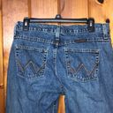 Wrangler  cash cowgirl cut jeans raw hem size 7/8x34 western rodeo wranglers jean Photo 6