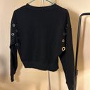 Good American  grommet sweater size 0 or XS slightly cropped but hangs at waist Photo 5