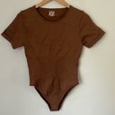 One Piece Women’s Brown OQQ  short sleeve fitted bodysuit, size XL Photo 1