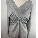 Donna Karen Empire twist top in silver. New without tag size XL.
OK Photo 2