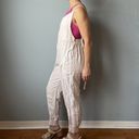 Free People Movement  One Piece Split Rock Jumpsuit in Ivory Size Small Photo 4