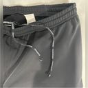 Brooks  women’s black wide leg Running Sweatpants size medium Photo 7