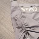 Nike  pro gray side cinch ties size large Photo 1