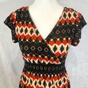 Cristina Love black and burnt orange abstract print smocked dress size medium Photo 1