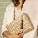 NWT Virginia Wolf Gold woven clutch Photo 0