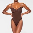 SKIMS Sculpting thong bodysuit in Cocoa NWOT size S Photo 0