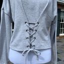 Love, Fire NWOT  Lace Up Gray Sweatshirt M Photo 1