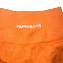 Alphalete seamless bike shorts orange XS 4” Photo 2