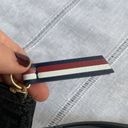 Tommy Hilfiger  NWOT black wristlet. Photo 7