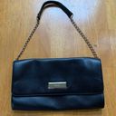 DKNY   authentic black leather chain clutch purse bag, Medium. Photo 0