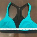 Lululemon sports bra sz 6 color is actually green Not sure why its showing blue. Photo 1