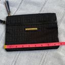 Tommy Hilfiger  NWOT black wristlet. Photo 8