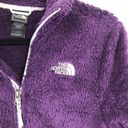 The North Face  purple fuzzy jacket Photo 1