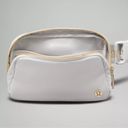 Lululemon  Everywhere Belt Bag Vapor Gold White Wordmark Logo Crossbody Bag NWT Photo 3