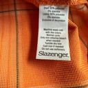 Slazenger  size 12 golf skort orange navy white plaid Photo 4