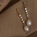 Elegant white pearl dangle drop earrings for women Gold Photo 2