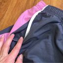 Nike  womens pink & gray track pants large Photo 1