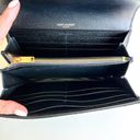 Saint Laurent  Large YSL Grain de Poudre Leather Flap Wallet Photo 6