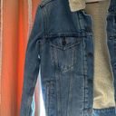 Levi’s Sherpa-Lined Denim Trucker Jacket Photo 1