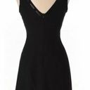 Bebe Short Black Cocktail Dress with slit Photo 0