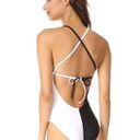 PilyQ New.  Black and white one piece.￼ Photo 2