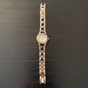 Relic BY FOSSIL-TWO TONE WATCH Beautiful gold and silver tone stainless steel watch with little diamond rhinestones, excellent condition, I have attached a video showing the watch works great. Photo 4