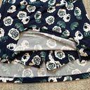 Night Moves Golftini  navy blue/ green and white floral golf skort sz L Photo 1