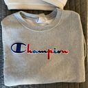 Champion  crew neck sweatshirt gray with red and blue letters Photo 1