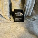 The North Face women’s gray hoodie  Photo 1