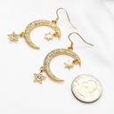 Moon and Star Dangle Earrings Photo 1