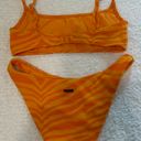 Triangl Mica Orange Zebra Photo 1