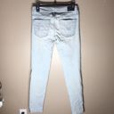 American Eagle  distressed skinny jeans size 4 light wash color holy jeans​​ Photo 7