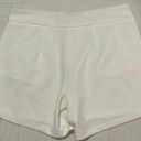 Absolutely Famous White Gold Buttoned Shorts Photo 3