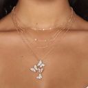 Gold Layered Chain Butterfly Necklace Photo 1