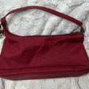 DKNY  red monogram purse. Shoulder bag. Some cracking on inside of strap Photo 1