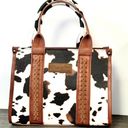 Wrangler ALLOVER COW PRINT CROSS BODY MINI TOTE IN BLACK/WHITE Photo 0