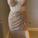 Cinderella Divine Women’s formal sparkly dress size 4
Brand is 
Rose gold color Photo 2