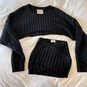 Dolls Kill Tyler Lambert Black Varsity Knit Cropped Long Sleeve Sweater and Mini Skirt Set Photo 1