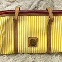 Dooney & Bourke  Yellow and White Striped Barrel Bag Photo 0