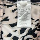 Bebe  Floral Animal print blend joggers with faux leather side pockets. Size M Photo 12