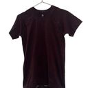 Sweaty Betty  athletic seem less workout short sleeve maroon t shirt. Size large Photo 0