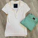 American Eagle 🌺🎉HP🎉🌺 A/E White Polo Short Sleeve Shirt Photo 0