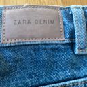 ZARA  denim mini skirt, size 11/12. It is slightly distressed with a raw hem. Photo 5