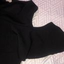 Caution to the Wind Fitted black dress with ruffle cut out detail Photo 2