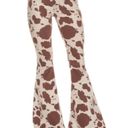 Altar'd State Flare Cowprint Jeans Photo 0