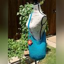 The Sak  Bucket Bag Turquoise Blue Crochet Crossbody Hobo Bag with Flower Charm Photo 1