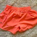 Lululemon bright coral shorts 4’ Photo 1