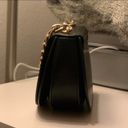 Charles and Keith Charles Keith Black Saddle Bag With Gold Chain Detail Photo 1